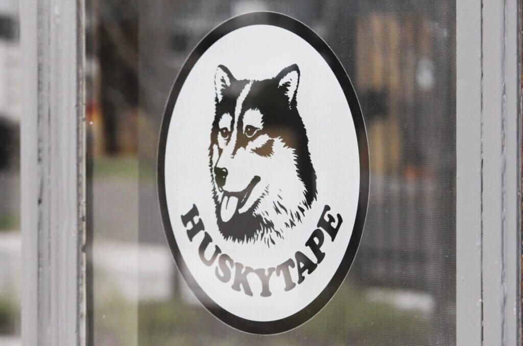Logo_Window Husky Tape dog logo displayed on a window